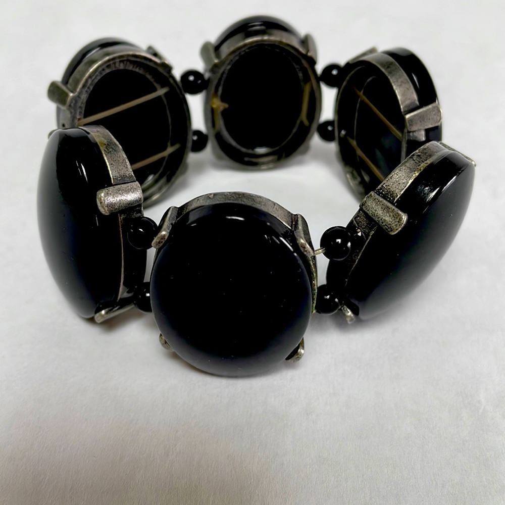 Free add on with bundle. Chunky black and burnished metal bracelet.
